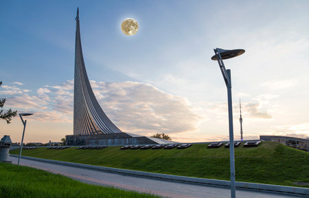Conquerors of Space Monument (Night view, with the super moon) in the park outdoors of Cosmonautics museum, near VDNK exhibition center, Moscow, Russiaの写真素材