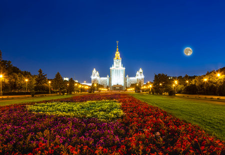 Lomonosov Moscow State University on Sparrow Hills (at night with the super moon), main building, Russia. It is the highest-ranking Russian educational institutionの写真素材
