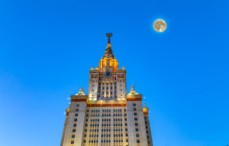 Lomonosov Moscow State University on Sparrow Hills (at night with the super moon), main building, Russia. It is the highest-ranking Russian educational institutionの写真素材