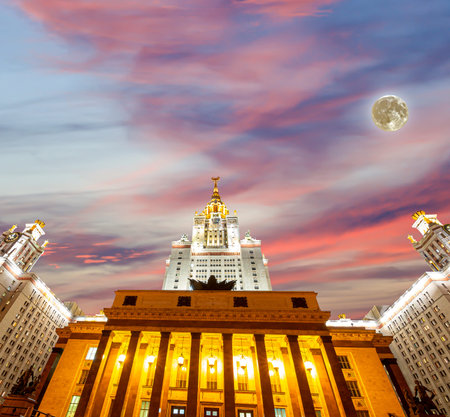 Lomonosov Moscow State University on Sparrow Hills (against the background of a beautiful sunset with the super moon), main building, Russia. It is the highest-ranking Russian educational institutionの写真素材