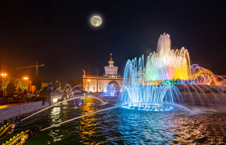 Fountain Stone Flower (at night with the super moon) at VDNKh in Moscow. VDNKh (called also All-Russian Exhibition Center) is a permanent general-purpose trade show in Moscow, Russiaの写真素材