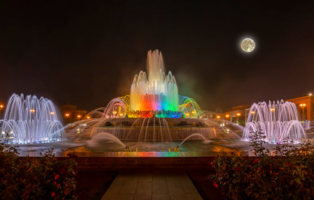 Fountain Stone Flower (at night with the super moon) at VDNKh in Moscow. VDNKh (called also All-Russian Exhibition Center) is a permanent general-purpose trade show in Moscow, Russiaの写真素材