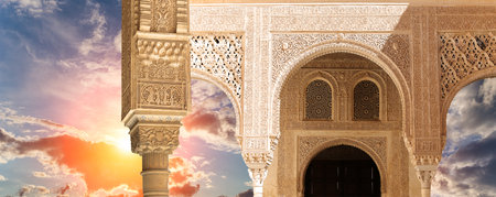 Arches in Islam (Moorish) style (against the sunset) in Alhambra, Granada, Spainの写真素材