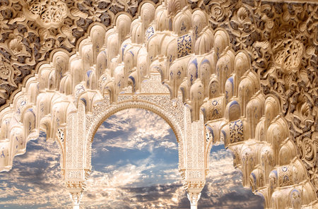 Arches in Islam (Moorish) style (against the background of a beautiful evening sky with clouds) in...