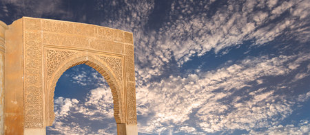 Columns in Moorish style in Alhambra (carved on white background), Granada, Spainの写真素材