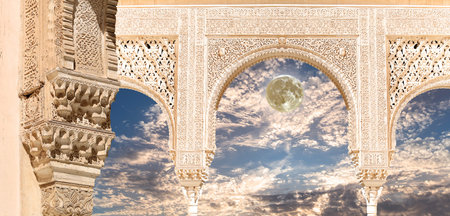 Arches in Islamic (Moorish) style (against the background of a beautiful evening sky with clouds...