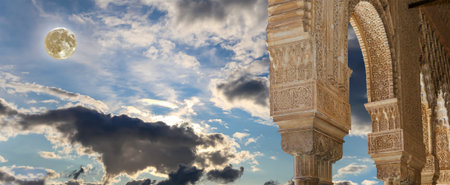 Arches in Islamic (Moorish) style (against the background of a beautiful evening sky with clouds...