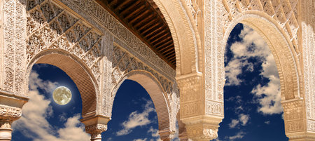 Arches in Islamic (Moorish) style (against the background of a beautiful evening sky with clouds...