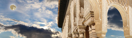 Arches in Islamic (Moorish) style (against the background of a beautiful evening sky with clouds...