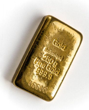 Cast gold bar weighing 250 grams on the white background. の写真素材