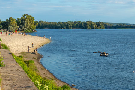 Bank of the Dnieper river and the beach in Kremenchuk city, Ukraine. summer sunny dayの写真素材