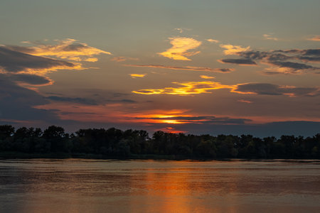 Beautiful sunset over the Dnieper river and forest in Ukraineの写真素材