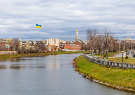 River embankment and a view of Kharkiv city on a cloudy dayの写真素材