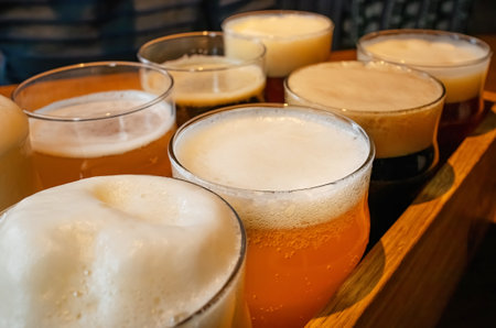 Assorted beer in glasses close-up. Beer set, selective focusの写真素材