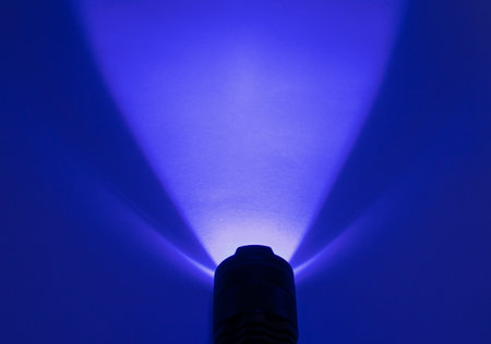 Light from an ultraviolet LED lamp. UV LED flashlight. Ray with a wavelength of UV-365 nmの写真素材