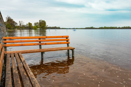 High water level in spring flooded the embankment and the beach in Kremenchuk city (Kremenchug), Ukraine. Dnipro river (Dnieper)の写真素材