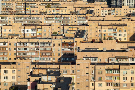 Dense urban development with multi-storey buildings in a residential area of the city, cityscape on a sunny dayの写真素材
