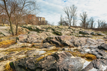 Igneous rock or magmatic rock outdoors - geological structure. âRock-registerâ is a natural monument located in Kremenchuk city (Ukraine)の写真素材