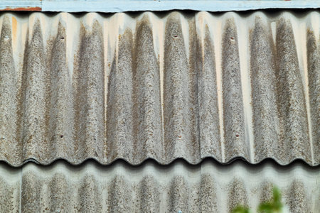 The roof is covered with corrugated asbestos cement sheetsの写真素材