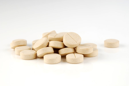 Yellow pills pileの写真素材