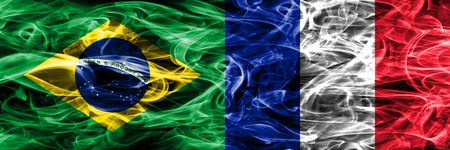 Brazil vs France smoke flags placed side by sideの写真素材