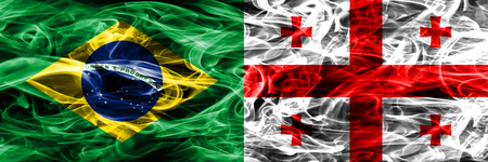 Brazil vs Georgia smoke flags placed side by sideの写真素材