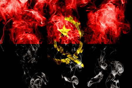 National flag of Angola made from colored smoke isolated on black backgroundの写真素材