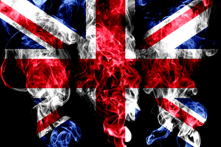 National flag of United Kingdom made from colored smoke isolated on black backgroundの写真素材