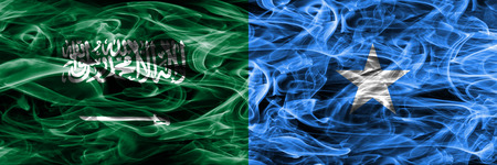 Saudi Arabia vs Somalia smoke flags placed side by side. Thick colored silky smoke flags of Saudi Arabia and Somaliaの写真素材