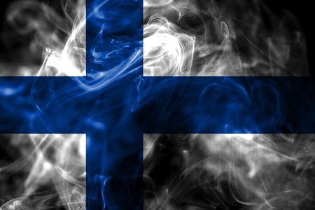National flag of Finland made from colored smoke isolated on black background. Abstract silky wave background.の写真素材