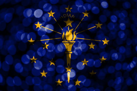Indiana abstract blurry bokeh flag. Christmas, New Year and National day concept flag. United States of America.の写真素材