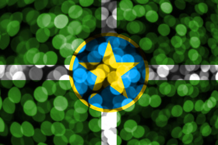 Jackson, Mississippi abstract blurry bokeh flag. Christmas, New Year and National day concept flag. United States of America.の写真素材
