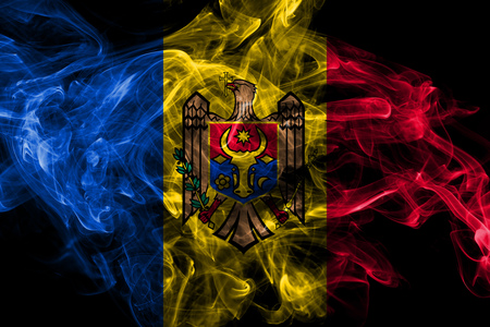Moldova smoke flag isolated on black backgroundの写真素材