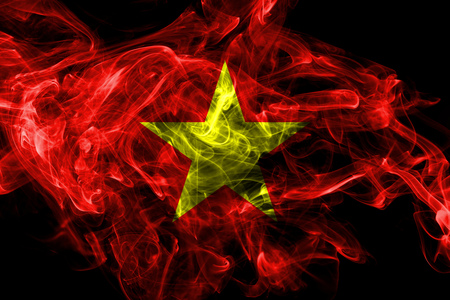 Vietnam smoke flag isolated on black backgroundの写真素材
