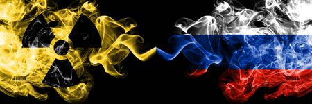 Russia, Russian vs nuclear smoky mystic flags placed side by side. Thick colored silky smokes combination of Russia, Russian flag and radioactive sign.の写真素材