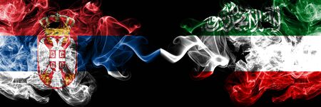 Serbia vs Somaliland smoky mystic flags placed side by side. Thick colored silky smokes combination of Serbian and Somaliland flagの写真素材