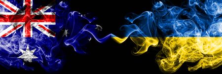 Australia vs Ukraine, Ukrainian smoky mystic flags placed side by side. Thick colored silky smokes combination of national flags of Australia and Ukraine, Ukrainianの写真素材