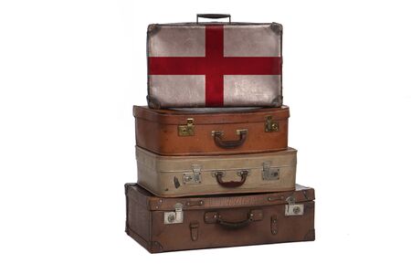 England, English travel concept. Group of vintage suitcases isolated on white backgroundの写真素材