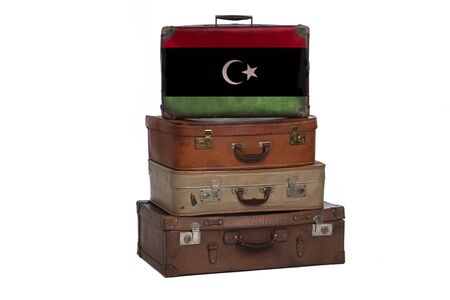 Libya, Libyan travel concept. Group of vintage suitcases isolated on white backgroundの写真素材