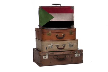 Sudan, Sudanese travel concept. Group of vintage suitcases isolated on white backgroundの写真素材