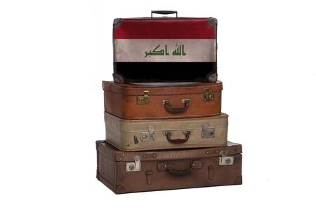 Iraq, Iraqi travel concept. Group of vintage suitcases isolated on white backgroundの写真素材