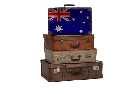 Australia, Australian travel concept. Group of vintage suitcases isolated on white backgroundの写真素材