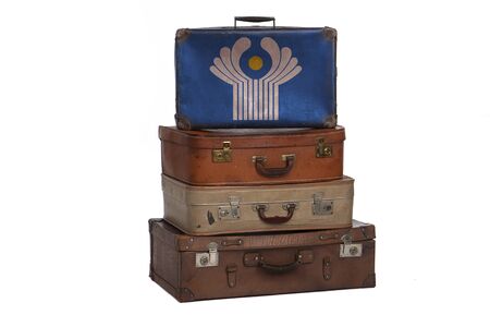 Commonwealth travel concept. Group of vintage suitcases isolated on white backgroundの写真素材