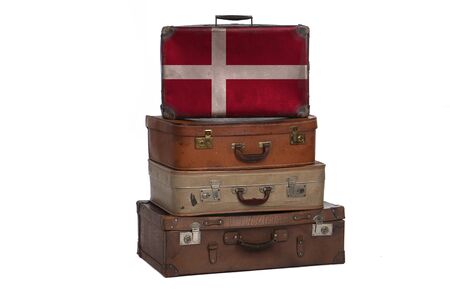 Denmark, Danish travel concept. Group of vintage suitcases isolated on white backgroundの写真素材