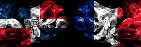 Dominican Republic, Dominican, France, French smoky mystical flags placed side by side. Thick colored silky smokes flag conceptの写真素材