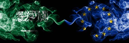 Saudi Arabia Kingdom vs European Union, EU smoky mystic flags placed side by side. Thick colored silky smoke flags of Arabic, Arabian and European Union, EUの写真素材