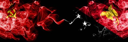 Communist vs Papua New Guinea abstract smoky mystic flags placed side by side. Thick colored silky smoke flags of Communism and Papua New Guineaの写真素材