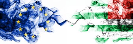 Eu, European Union vs Abkhazia, Abkhazian smoky mystic flags placed side by side. Thick colored silky abstract smoke flags combinationの写真素材