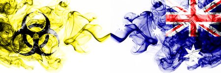 Australia, Australian Quarantine. Coronavirus COVID-19 lockdown. Smoky mystic flag of Australia, Australian with biohazard symbol placed side by side.の写真素材