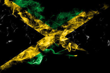 Jamaica, Jamaican smoke flag isolated on black backgroundの写真素材